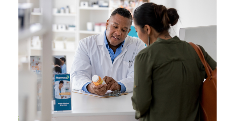 Pharmacist giving advice to a patient.