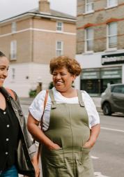 Two women walking down the street